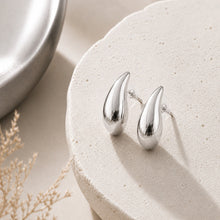 Load image into Gallery viewer, Gold teardrop stud earrings with a minimalist high-polish finish, featuring chunky design for statement jewelry by Luxe Treasures.