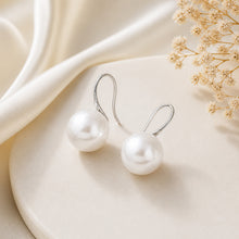 Load image into Gallery viewer, Sterling silver and gold handmade pearl huggie earrings with delicate design, perfect for elegant jewelry collection.