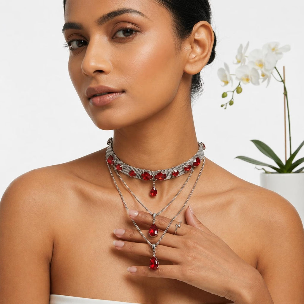 Silver choker necklace with red crystal accents, statement jewelry for women, featuring Luxe Treasures design.