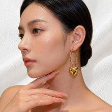 Load image into Gallery viewer, Luxury heart drop hoop earrings by Luxe Treasures in a gift box, featuring elegant fashion jewelry for women.