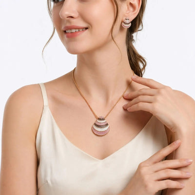 Multicolor beaded shell pendant necklace and earrings set in bohemian style, featuring handcrafted jewelry from Luxe Treasures.