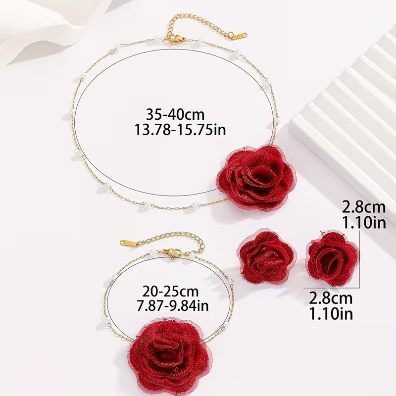 Luxe Treasures floral jewelry set with red, black, and white necklace, bracelet, and earrings in a premium gift box.