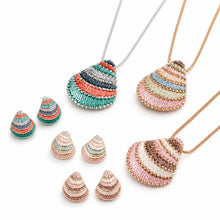 Load image into Gallery viewer, Multicolor beaded shell pendant necklace and earrings set in bohemian style jewelry with handcrafted details.