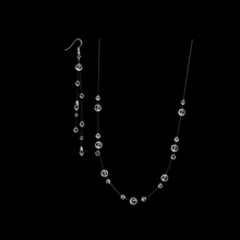 Load image into Gallery viewer, Elegant crystal dewdrop necklace and long tassel earrings jewelry set with sparkling crystals for women by Luxe Treasures.