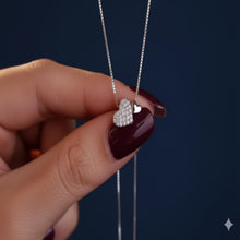 Load image into Gallery viewer, Sterling silver heart pendant necklace with zirconia accents on a delicate clavicle chain, designed by Luxe Treasures.