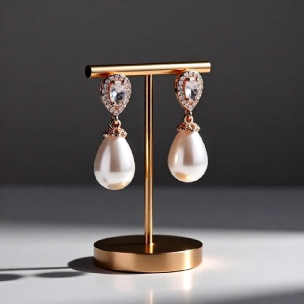 Luxe Treasures teardrop pearl dangle earrings with crystal halo design, perfect for bridal jewelry and special occasions.