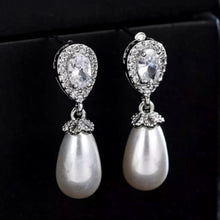 Load image into Gallery viewer, Luxe Treasures teardrop pearl dangle earrings with crystal halo accents, elegant bridal jewelry for special occasions.