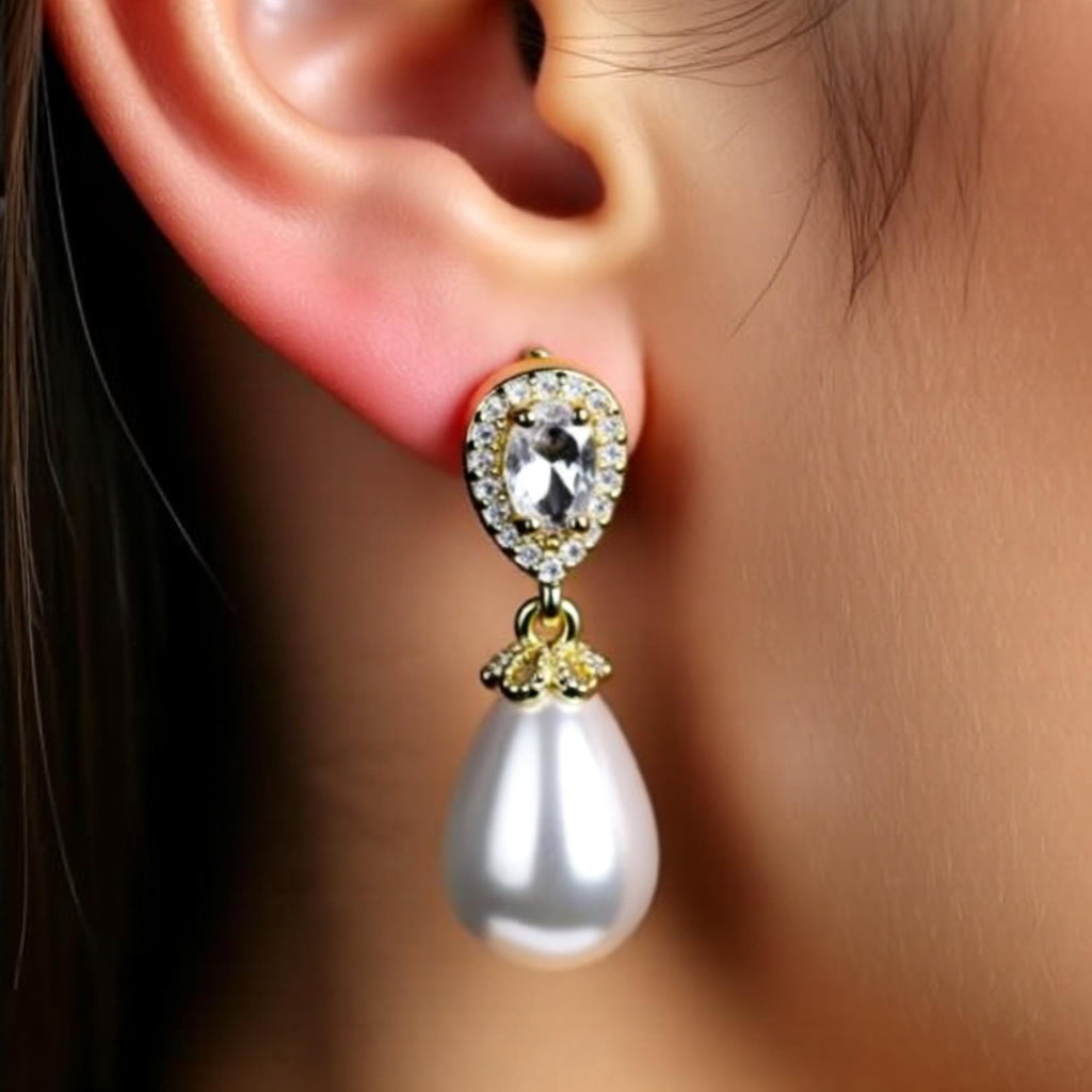 Teardrop pearl dangle earrings with crystal halo accents, elegant bridal jewelry by Luxe Treasures.