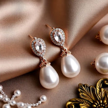 Load image into Gallery viewer, Luxe Treasures teardrop pearl dangle earrings with crystal halo design, elegant bridal jewelry for special occasions