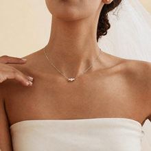 Load image into Gallery viewer, Dainty freshwater pearl gold necklace by Luxe Treasures, minimalist layering jewelry with three elegant pearls on a gold chain.