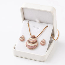 Load image into Gallery viewer, Beach-inspired shell necklace set necklace and matching earrings, featuring intricate beadwork and shell accents.