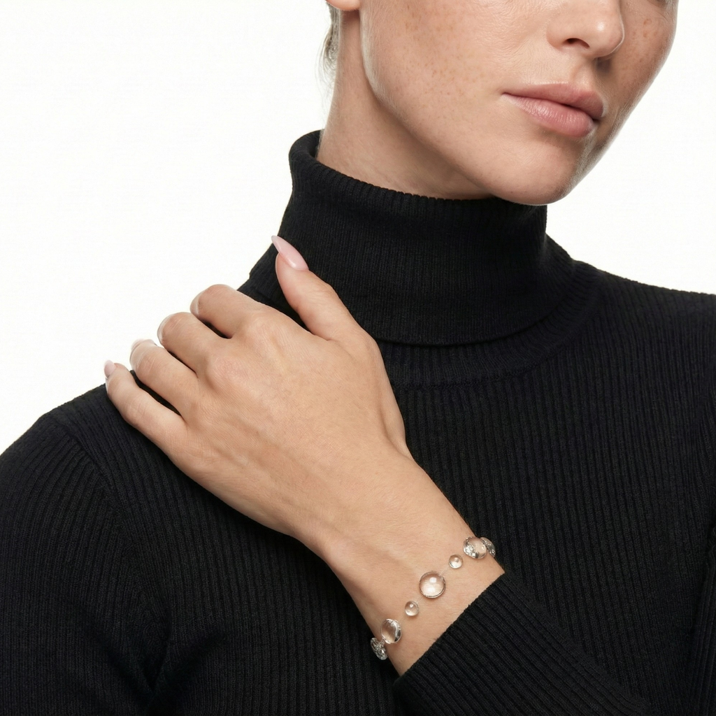 Dewdrop bracelet by Luxe Treasures featuring clear resin and handmade minimal jewelry design on a neutral background.